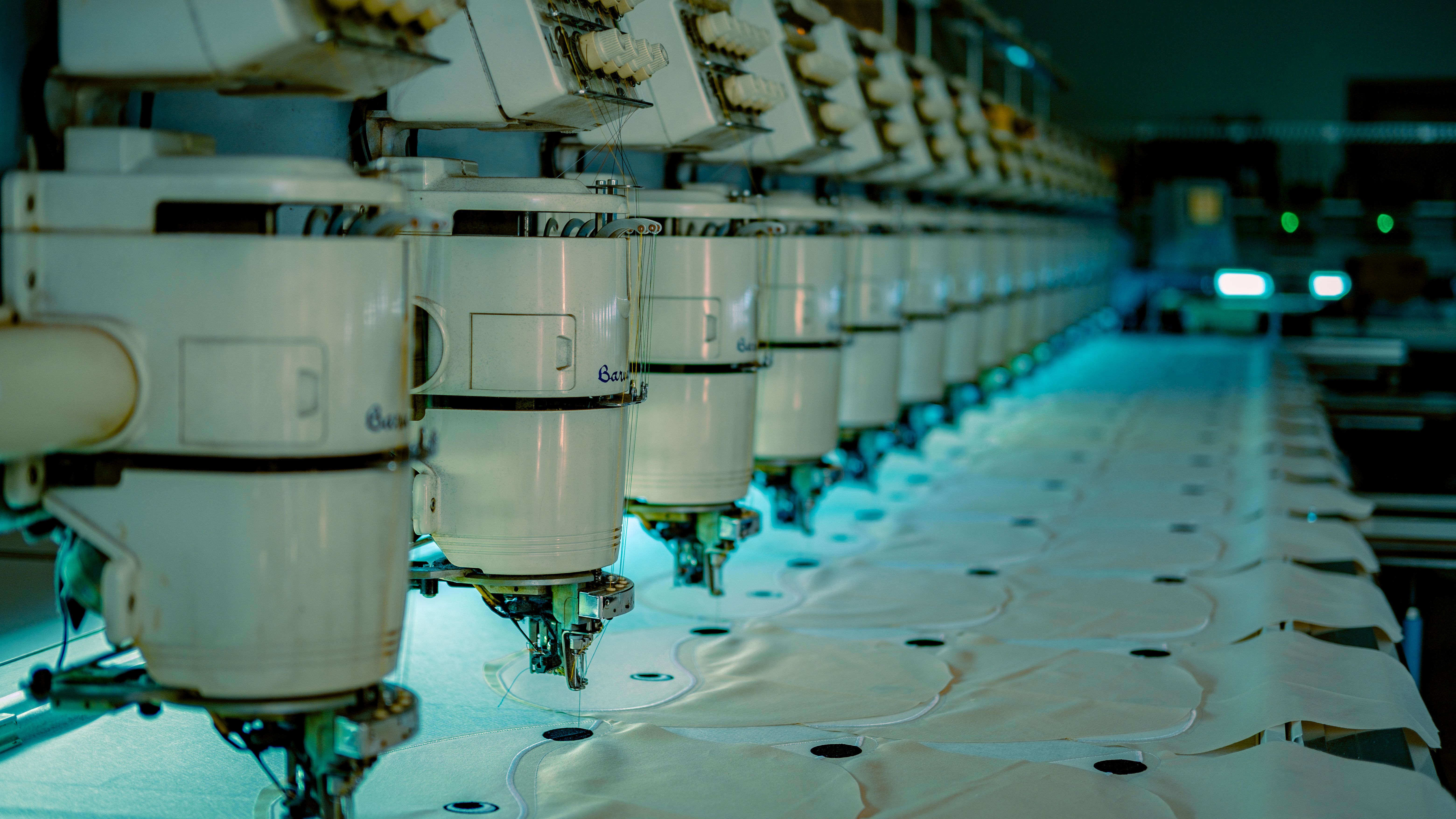 Multi-head embroidery machines